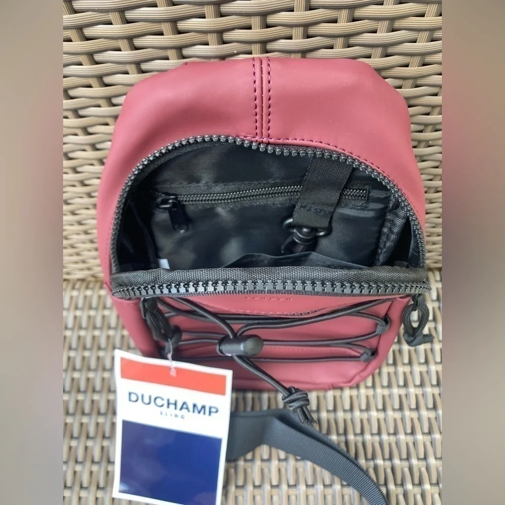 Duchamp Rubberized Sling Bag Dusty Pink Mauve NWT